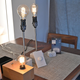 From left to right: the standard vintage bulb, the globe-style bulb, and the tube-style Hue bulb.